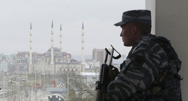 Law enforcers. Grozny. Photo: REUTERS/S.Dal Law enforcers. Grozny. Photo: REUTERS/S.Dal