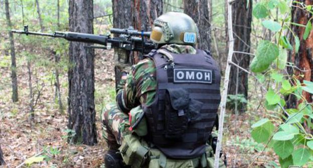 OMON agent. Photo: NAC press service, http://nac.gov.ru/antiterroristicheskie-ucheniya/antiterroristicheskie-ucheniya-v-respublike-0.html#&gid=1&pid=2 OMON agent. Photo: NAC press service, http://nac.gov.ru/antiterroristicheskie-ucheniya/antiterroristicheskie-ucheniya-v-respublike-0.html#&gid=1&pid=2