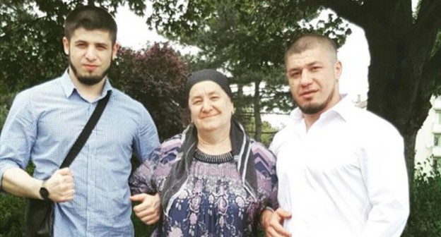 Murad Aslamkhanov (right) with his mother and brother. Photo courtesy of Murad Aslamkhanov's relatives. Murad Aslamkhanov (right) with his mother and brother. Photo courtesy of Murad Aslamkhanov's relatives.