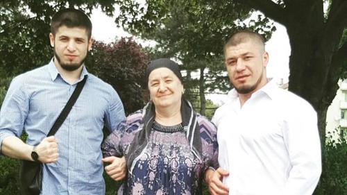 Murad Aslamkhanov (right) with his mother and brother. Photo courtesy of Murad Aslamkhanov's relatives. Murad Aslamkhanov (right) with his mother and brother. Photo courtesy of Murad Aslamkhanov's relatives.