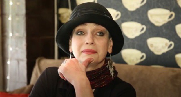 Svetlana Anokhina. Screenshot of the video at the Mahach Abdulaev YouTube channel https://youtu.be/_oiwaATCV0c Svetlana Anokhina. Screenshot of the video at the Mahach Abdulaev YouTube channel https://youtu.be/_oiwaATCV0c