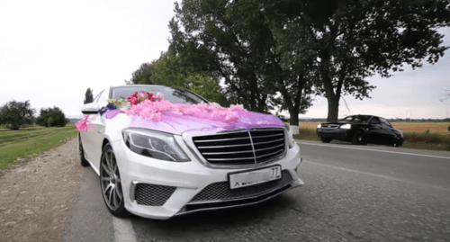 A wedding cortege. Screenshot of the video https://www.youtube.com/watch?v=EU8rWT-FgPQ A wedding cortege. Screenshot of the video https://www.youtube.com/watch?v=EU8rWT-FgPQ