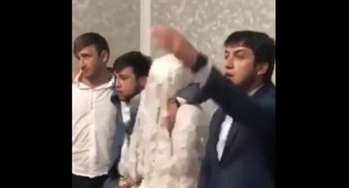 Screenshot from a video shooting where a resident of Dagestan behaved insultingly towards his own bride: https://vk.com/wall-74219800_766567?reply=769430 Screenshot from a video shooting where a resident of Dagestan behaved insultingly towards his own bride: https://vk.com/wall-74219800_766567?reply=769430
