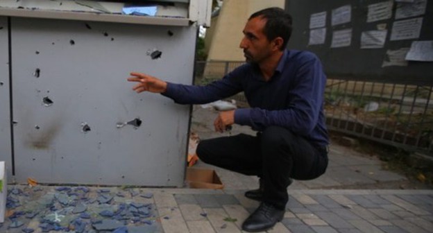 Resident of a village in Azerbaijan shows traces from shelling attacks. Photo by Aziz Karimov for the Caucasian Knot Resident of a village in Azerbaijan shows traces from shelling attacks. Photo by Aziz Karimov for the Caucasian Knot