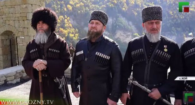 Mufti of Chechnya Salakh Mezhiev, head of Chechnya Ramzan Kadyrov and State Duma deputy Adam Delimkhanov at the opening ceremony of the reconstructed ancient settlement of Khoi. Screenshot: https://www.youtube.com/watch?v=TCjxw764SnM Mufti of Chechnya Salakh Mezhiev, head of Chechnya Ramzan Kadyrov and State Duma deputy Adam Delimkhanov at the opening ceremony of the reconstructed ancient settlement of Khoi. Screenshot: https://www.youtube.com/watch?v=TCjxw764SnM