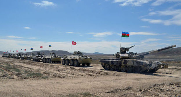 Military vehicles with flags of Azerbaijan and Turkey. Photo: press service of the Ministry of Defence of Azerbaijan Military vehicles with flags of Azerbaijan and Turkey. Photo: press service of the Ministry of Defence of Azerbaijan