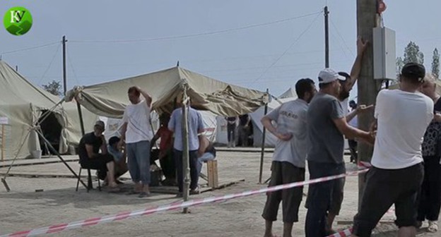 A tent camp in Kullar. Screenshot from the video posted by the Caucasian Knot at: https://www.youtube.com/watch?v=FvC3Fw73mK4&feature=emb_logo A tent camp in Kullar. Screenshot from the video posted by the Caucasian Knot at: https://www.youtube.com/watch?v=FvC3Fw73mK4&feature=emb_logo