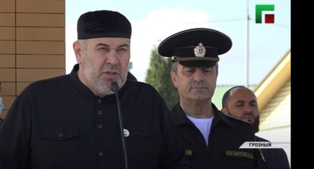 Officials at a ceremony to commission a residential building in Gudermes on October 7, 2010. Screenshot of the video by the "Caucasian Knot" https://www.youtube.com/watch?v=Ee9whMD0OjE Officials at a ceremony to commission a residential building in Gudermes on October 7, 2010. Screenshot of the video by the "Caucasian Knot" https://www.youtube.com/watch?v=Ee9whMD0OjE