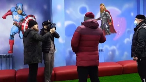 Ramzan Kadyrov near the images of characters from US movies and Marvel comics on the walls of the children's centre in Kurchaloi. Screenshot of Ramzan Kadyrov's post on the VKontakte https://vk.com/ramzan?w=wall279938622_543529&z=video279938622_456243691%2F521a68267418560268%2Fpl_post_279938622_543529 Ramzan Kadyrov near the images of characters from US movies and Marvel comics on the walls of the children's centre in Kurchaloi. Screenshot of Ramzan Kadyrov's post on the VKontakte https://vk.com/ramzan?w=wall279938622_543529&z=video279938622_456243691%2F521a68267418560268%2Fpl_post_279938622_543529