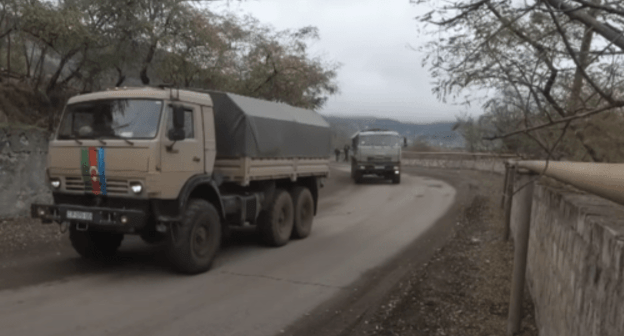 The Azerbaijani vehicles in Nagorno-Karabakh escorted by Russian peacemakers. Screenshot of the video https://youtu.be/5IhmwOYyZPA The Azerbaijani vehicles in Nagorno-Karabakh escorted by Russian peacemakers. Screenshot of the video https://youtu.be/5IhmwOYyZPA