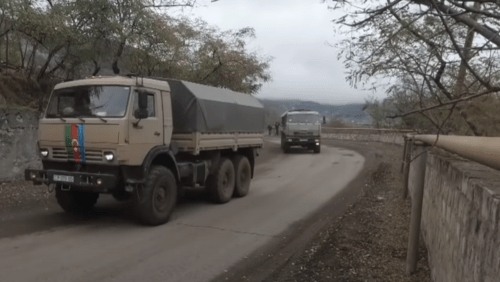 The Azerbaijani vehicles in Nagorno-Karabakh escorted by Russian peacemakers. Screenshot of the video https://youtu.be/5IhmwOYyZPA The Azerbaijani vehicles in Nagorno-Karabakh escorted by Russian peacemakers. Screenshot of the video https://youtu.be/5IhmwOYyZPA