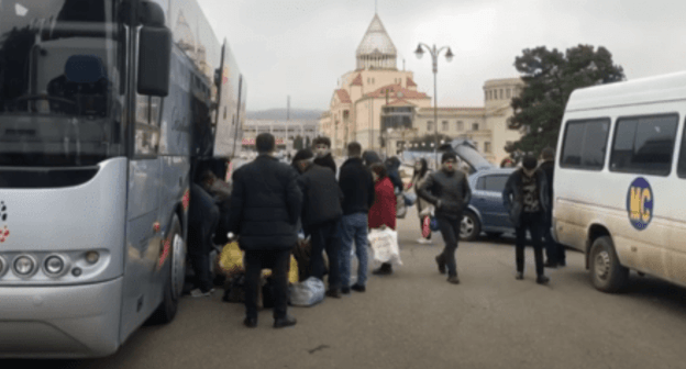 Buses with the refugees who returned to Stepanakert. November 20, 2020. Screenshot of the video by the Russian Ministry of Defence https://youtu.be/y5xgtPDxz-g Buses with the refugees who returned to Stepanakert. November 20, 2020. Screenshot of the video by the Russian Ministry of Defence https://youtu.be/y5xgtPDxz-g