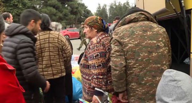 People are returning to Nagorno-Karabakh accompanied by the Russian peacekeepers. Screenshot from the Caucasian Knot video: https://www.youtube.com/watch?v=y5xgtPDxz-g People are returning to Nagorno-Karabakh accompanied by the Russian peacekeepers. Screenshot from the Caucasian Knot video: https://www.youtube.com/watch?v=y5xgtPDxz-g
