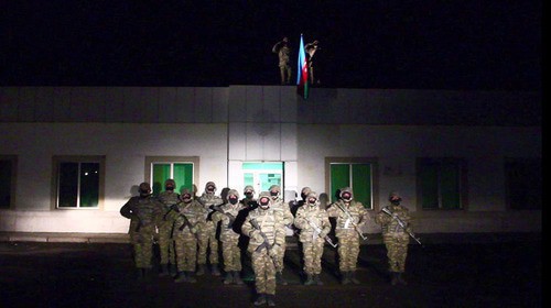 Azerbaijani soldiers in the Lachin District of Nagorno-Karabakh on December 1, 2020. Screenshot of the video by Azərbaycan Respublikası Müdafiə Nazirliyi https://www.youtube.com/watch?v=0PbCAhxR5qQ&feature=emb_logo Azerbaijani soldiers in the Lachin District of Nagorno-Karabakh on December 1, 2020. Screenshot of the video by Azərbaycan Respublikası Müdafiə Nazirliyi https://www.youtube.com/watch?v=0PbCAhxR5qQ&feature=emb_logo