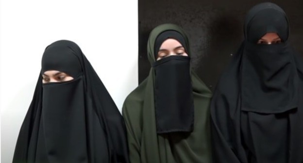 The "educational conversation" of the Chechen Mufti and the girls who had worn niqabs held at the police station. Screenshot of video by the "Grozny" TV Channel https://www.youtube.com/watch?v=SaHUSbalpGU The "educational conversation" of the Chechen Mufti and the girls who had worn niqabs held at the police station. Screenshot of video by the "Grozny" TV Channel https://www.youtube.com/watch?v=SaHUSbalpGU