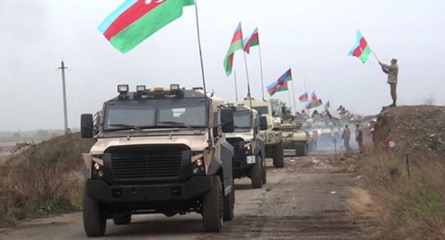 A convoy of Azerbaijani military vehicles. Photo by the press service of the Ministry of Defence of Azerbaijan https://mod.gov.az/ru/news/azerbajdzhanskaya-armiya-vodruzila-azerbajdzhanskij-flag-v-agdame-video-33862.html A convoy of Azerbaijani military vehicles. Photo by the press service of the Ministry of Defence of Azerbaijan https://mod.gov.az/ru/news/azerbajdzhanskaya-armiya-vodruzila-azerbajdzhanskij-flag-v-agdame-video-33862.html
