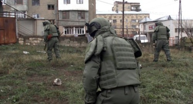 An emergency services worker in the street of Stepanakert, December 2, 2020. Photo by the press service of the Russian Ministry of Defence http://mil.ru/russian_peacekeeping_forces/news/more.htm?id=12327996@egNews An emergency services worker in the street of Stepanakert, December 2, 2020. Photo by the press service of the Russian Ministry of Defence http://mil.ru/russian_peacekeeping_forces/news/more.htm?id=12327996@egNews