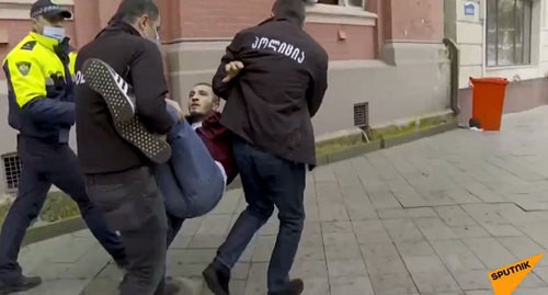 The police carry away a protester in Batumi. December 13, 2020. Screenshot of the video by the "Sputnik Грузия" https://www.youtube.com/watch?v=XW3Phkw6Mis&feature=emb_title The police carry away a protester in Batumi. December 13, 2020. Screenshot of the video by the "Sputnik Грузия" https://www.youtube.com/watch?v=XW3Phkw6Mis&feature=emb_title