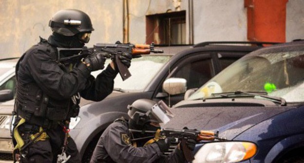 Law enforcers during CTO. Photo by the press service of the National Antiterrorist Committee (NAC) http://nac.gov.ru/antiterroristicheskie-ucheniya/taktiko-specialnoe-uchenie-groza-2015-v.html Law enforcers during CTO. Photo by the press service of the National Antiterrorist Committee (NAC) http://nac.gov.ru/antiterroristicheskie-ucheniya/taktiko-specialnoe-uchenie-groza-2015-v.html