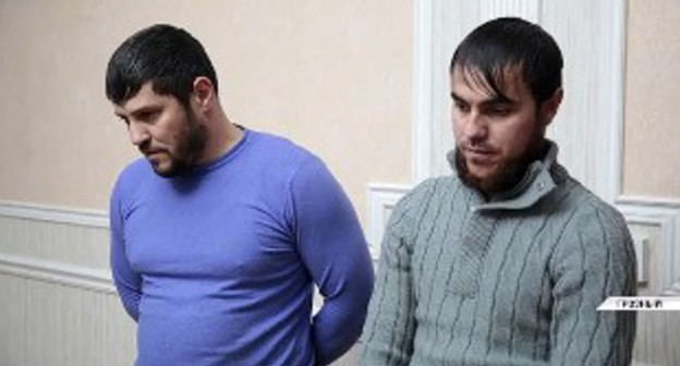Men detained in Chechnya for visiting a witch. Screenshot: https://www.instagram.com/p/CI7pCFNJclV/ Men detained in Chechnya for visiting a witch. Screenshot: https://www.instagram.com/p/CI7pCFNJclV/