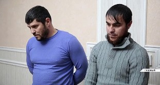 Men detained in Chechnya for visiting a witch. Screenshot: https://www.instagram.com/p/CI7pCFNJclV/ Men detained in Chechnya for visiting a witch. Screenshot: https://www.instagram.com/p/CI7pCFNJclV/