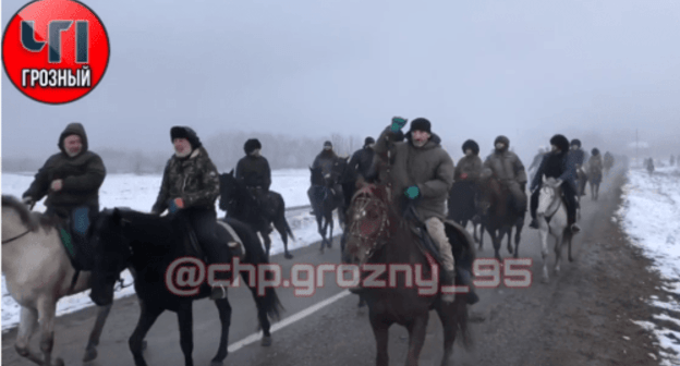 An equestrian march to the grave of Abdullakh Anzorov. Screenshot: https://www.instagram.com/p/CJAHGJpnRra/ An equestrian march to the grave of Abdullakh Anzorov. Screenshot: https://www.instagram.com/p/CJAHGJpnRra/