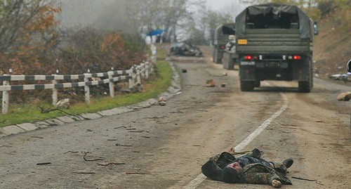 A dead man in military uniform during the hostilities in Nagorno-Karabakh. November 2020. Photo: REUTERS/Stringer A dead man in military uniform during the hostilities in Nagorno-Karabakh. November 2020. Photo: REUTERS/Stringer