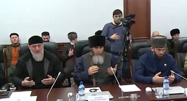 Adam Delimkhanov, deputy head of Chechen Government, Salakh Mezhiev, Mufti of Chechnya and Magomed Daudov, Speaker of the Chechen Parliament, attend ceremony of reconciliation of Ingush and Chechen teips in Grozny, January 7, 2021. Screenshot: https://www.instagram.com/p/CJypg7epIxu/ Adam Delimkhanov, deputy head of Chechen Government, Salakh Mezhiev, Mufti of Chechnya and Magomed Daudov, Speaker of the Chechen Parliament, attend ceremony of reconciliation of Ingush and Chechen teips in Grozny, January 7, 2021. Screenshot: https://www.instagram.com/p/CJypg7epIxu/