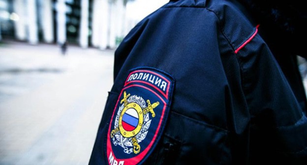 Law enforcer. Photo courtesy of Maxim Tishin / Yugopolis Law enforcer. Photo courtesy of Maxim Tishin / Yugopolis
