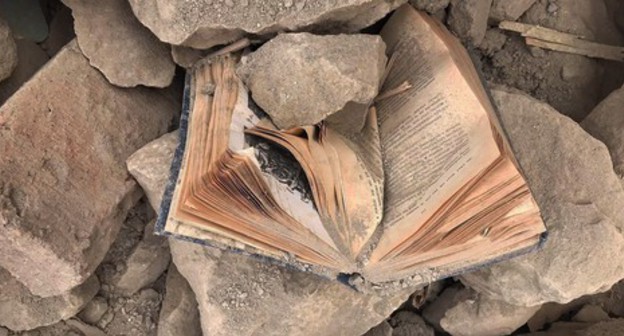 A book under the rubble of a home. November 2020. Photo by Alvard Grigoryan for the "Caucasian Knot" A book under the rubble of a home. November 2020. Photo by Alvard Grigoryan for the "Caucasian Knot"