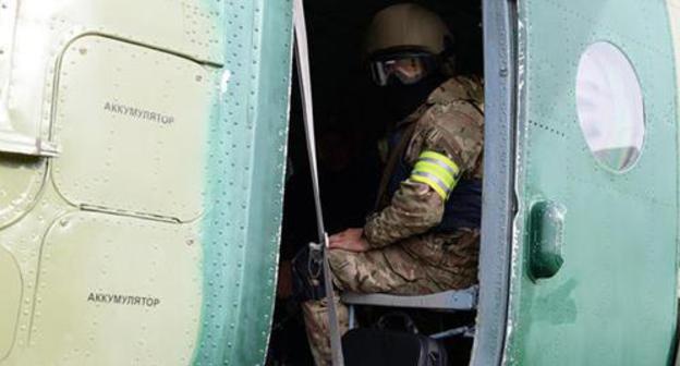 A law enforcer. Photo by the press service of the Russian National Antiterrorist Committee (NAC) http://nac.gov.ru A law enforcer. Photo by the press service of the Russian National Antiterrorist Committee (NAC) http://nac.gov.ru