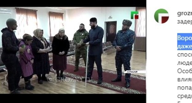 Adam Elzhurkaev, a theologian, is scolding three Kurchaloi women detained by law enforcers for providing occult services. Screenshot: https://www.instagram.com/p/CL40Ok0puL1/ Adam Elzhurkaev, a theologian, is scolding three Kurchaloi women detained by law enforcers for providing occult services. Screenshot: https://www.instagram.com/p/CL40Ok0puL1/