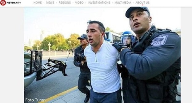 Policemen detaining Niyameddin Akhmedov. Screenshot: Meydan.TV Policemen detaining Niyameddin Akhmedov. Screenshot: Meydan.TV