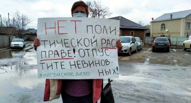 Alyona Sadovskaya holding a solo picket in front of the city court building. Photo courtesy of Alyona Sadovskaya Alyona Sadovskaya holding a solo picket in front of the city court building. Photo courtesy of Alyona Sadovskaya