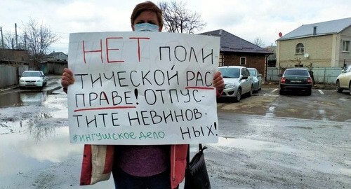 Alyona Sadovskaya holding a solo picket in front of the city court building. Photo courtesy of Alyona Sadovskaya Alyona Sadovskaya holding a solo picket in front of the city court building. Photo courtesy of Alyona Sadovskaya