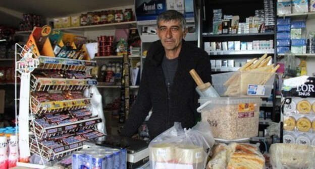 A shop owner in the town of Berdzor. Nagorno-Karabakh, March 21, 2021. Photo by Alvard Grigoryan for the "Caucasian Knot" A shop owner in the town of Berdzor. Nagorno-Karabakh, March 21, 2021. Photo by Alvard Grigoryan for the "Caucasian Knot"