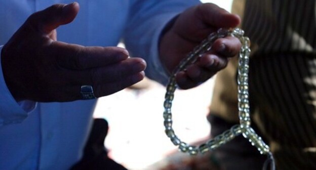 Hands of a Muslim praying. Photo by Aziz Karimov for the Caucasian Knot Hands of a Muslim praying. Photo by Aziz Karimov for the Caucasian Knot