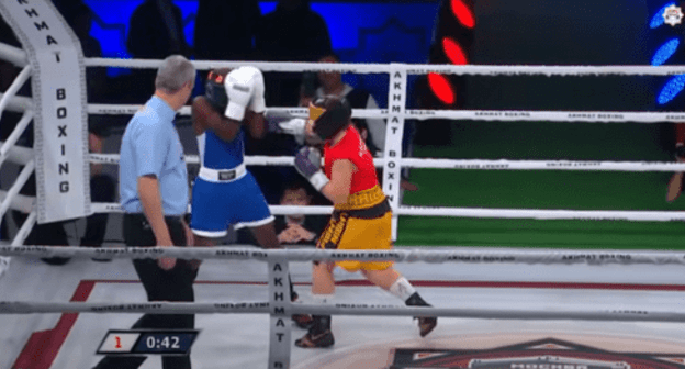 The fight of Adam Kadyrov with an athlete from Uganda, Mukisa Ukasha (dressed in blue). February 20, 2020. Screenshot of the video https://youtu.be/u4AKQhJg4hE The fight of Adam Kadyrov with an athlete from Uganda, Mukisa Ukasha (dressed in blue). February 20, 2020. Screenshot of the video https://youtu.be/u4AKQhJg4hE