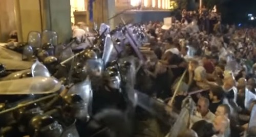 Clashes between law enforcers and activists at the Parliament of Georgia, June 21, 2019. Screenshot from the video posted by the Caucasian Knot Clashes between law enforcers and activists at the Parliament of Georgia, June 21, 2019. Screenshot from the video posted by the Caucasian Knot
