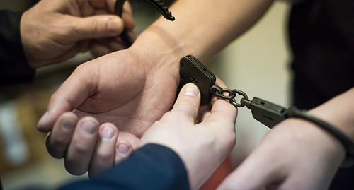 Handcuffs. Photo courtesy of Elena Sineok / Yuga.ru Handcuffs. Photo courtesy of Elena Sineok / Yuga.ru