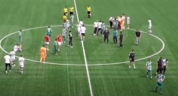 Mass brawl at a football match between the “Akhmat” and “Lokomotiv” teams in Chechnya. Screenshot: TUT.DAGESTAN, http://www.youtube.com/watch?v=aU-_KAe0HbQ Mass brawl at a football match between the “Akhmat” and “Lokomotiv” teams in Chechnya. Screenshot: TUT.DAGESTAN, http://www.youtube.com/watch?v=aU-_KAe0HbQ