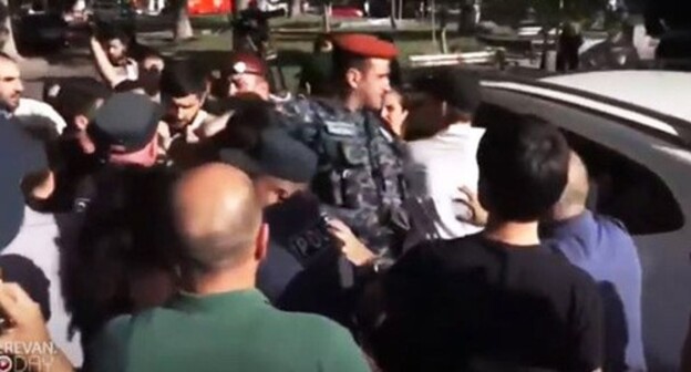 The detention of the participants of a protest action near the building of the Armenian Ministry for Public Health. June 2, 2021. Screenshot of the video https://www.youtube.com/watch?v=dfqEXIhJV8E The detention of the participants of a protest action near the building of the Armenian Ministry for Public Health. June 2, 2021. Screenshot of the video https://www.youtube.com/watch?v=dfqEXIhJV8E