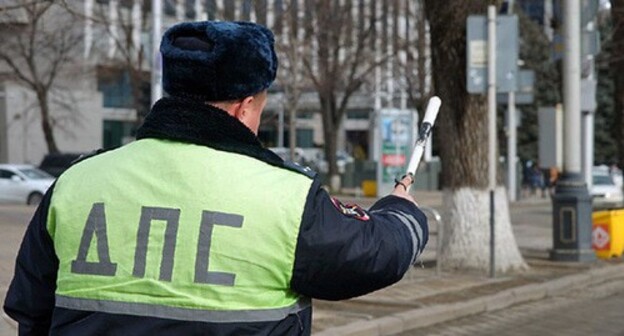 Traffic police inspector. Photo courtesy of Eugenia Melchenko, Yuga.ru Traffic police inspector. Photo courtesy of Eugenia Melchenko, Yuga.ru