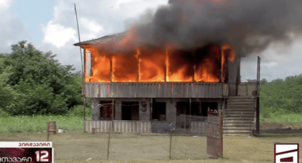 House on fire in Samegrelo, June 25, 2021. Screenshot: “Mtavari Arkhi” TV Company House on fire in Samegrelo, June 25, 2021. Screenshot: “Mtavari Arkhi” TV Company