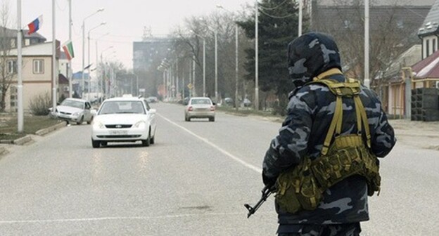 A law enforcer in the streets of Grozny. Photo: REUTERS/Stringer A law enforcer in the streets of Grozny. Photo: REUTERS/Stringer