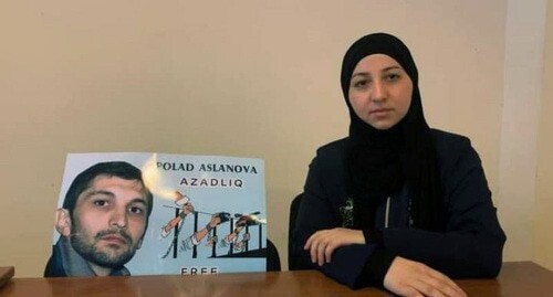 Gyulmira Aslanova with the photo of Polad Aslanov. Photo https://www.turan.az/ext/news/2020/12/free/Social/en/131347.htm Gyulmira Aslanova with the photo of Polad Aslanov. Photo https://www.turan.az/ext/news/2020/12/free/Social/en/131347.htm