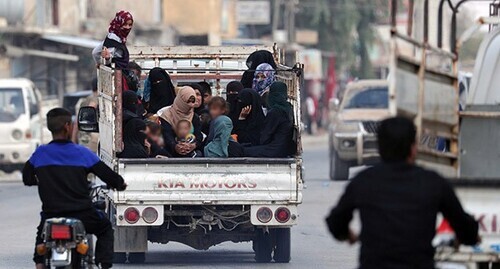 Women and children in a truck. Syria. Photo: REUTERS/Khalil Ashawi Women and children in a truck. Syria. Photo: REUTERS/Khalil Ashawi