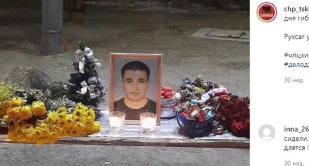 Flowers and candles at Inal Djabiev's portrait. Screenshot of the post on Instagram "ЧП / Цхинвал" https://www.instagram.com/p/CKlMRR1rjtq/ Flowers and candles at Inal Djabiev's portrait. Screenshot of the post on Instagram "ЧП / Цхинвал" https://www.instagram.com/p/CKlMRR1rjtq/