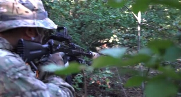 A special forces agent at the venue of the counterterrorist operation near the village of Talgi. Screenshot from video posted by the National Antiterrorism Committee of Russia A special forces agent at the venue of the counterterrorist operation near the village of Talgi. Screenshot from video posted by the National Antiterrorism Committee of Russia