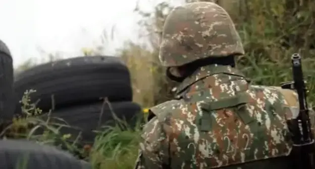 An Armenian soldier at a combat post. Screenshot of video posted by the Ministry of Defence of Armenia, http://mil.am/hy/news/9921 An Armenian soldier at a combat post. Screenshot of video posted by the Ministry of Defence of Armenia, http://mil.am/hy/news/9921